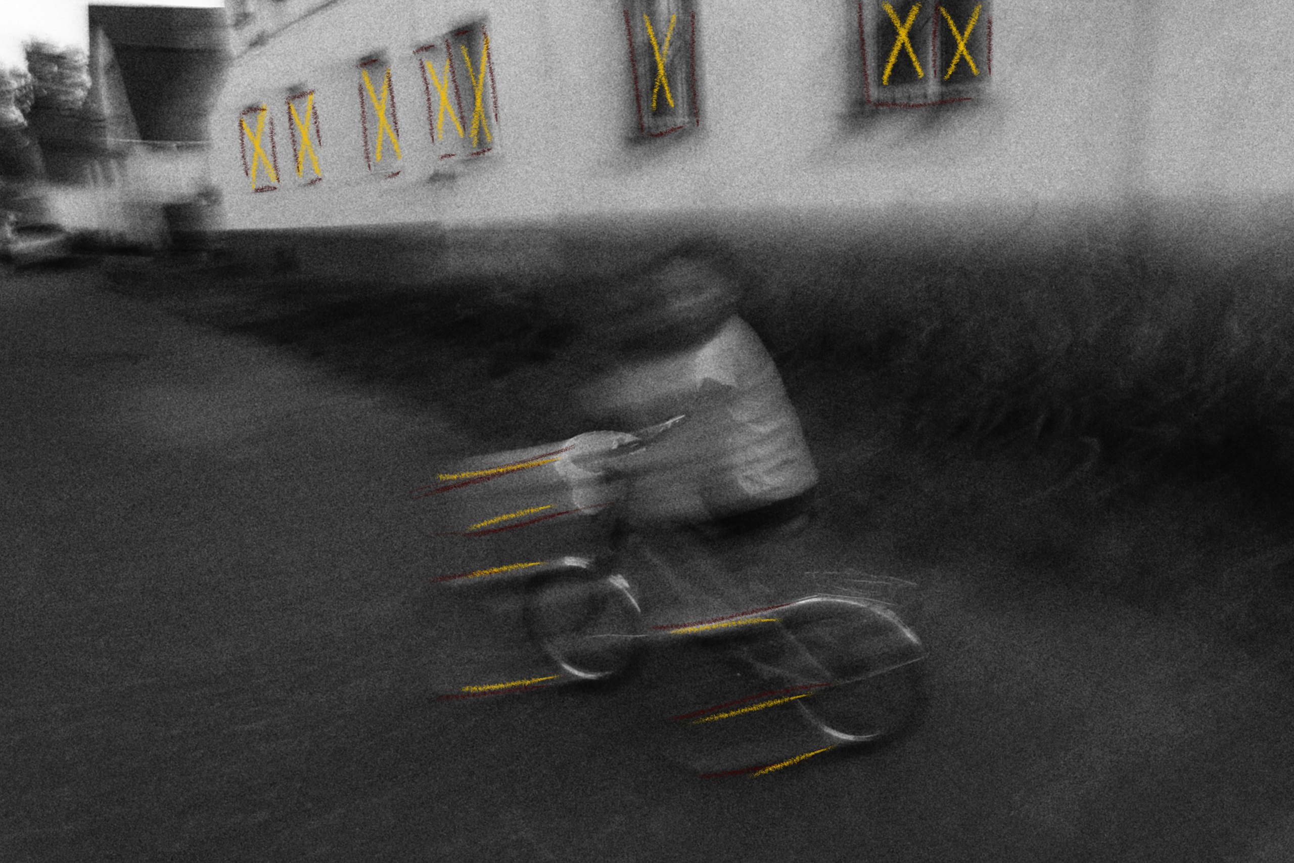 Video still: a cyclist blurred in motion