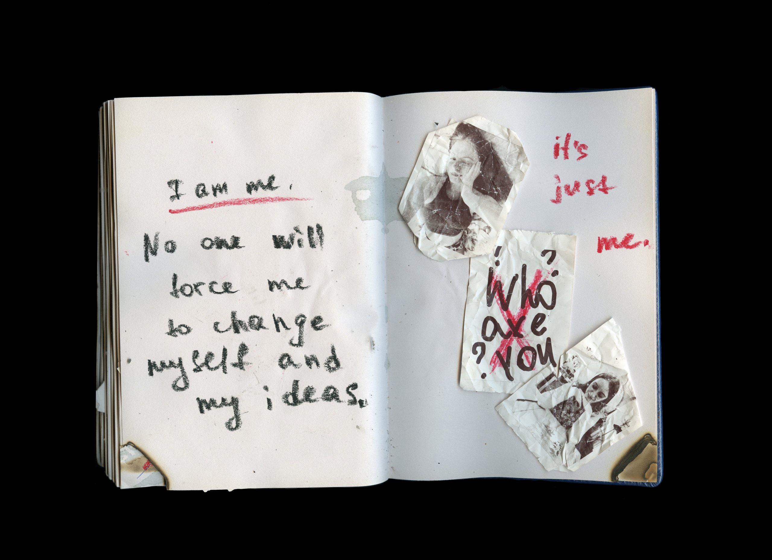 Sketchbook with the words I am me, no one will force me to change myself and my ideas