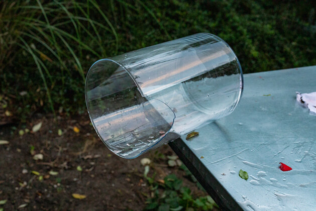 An overturned glass vase